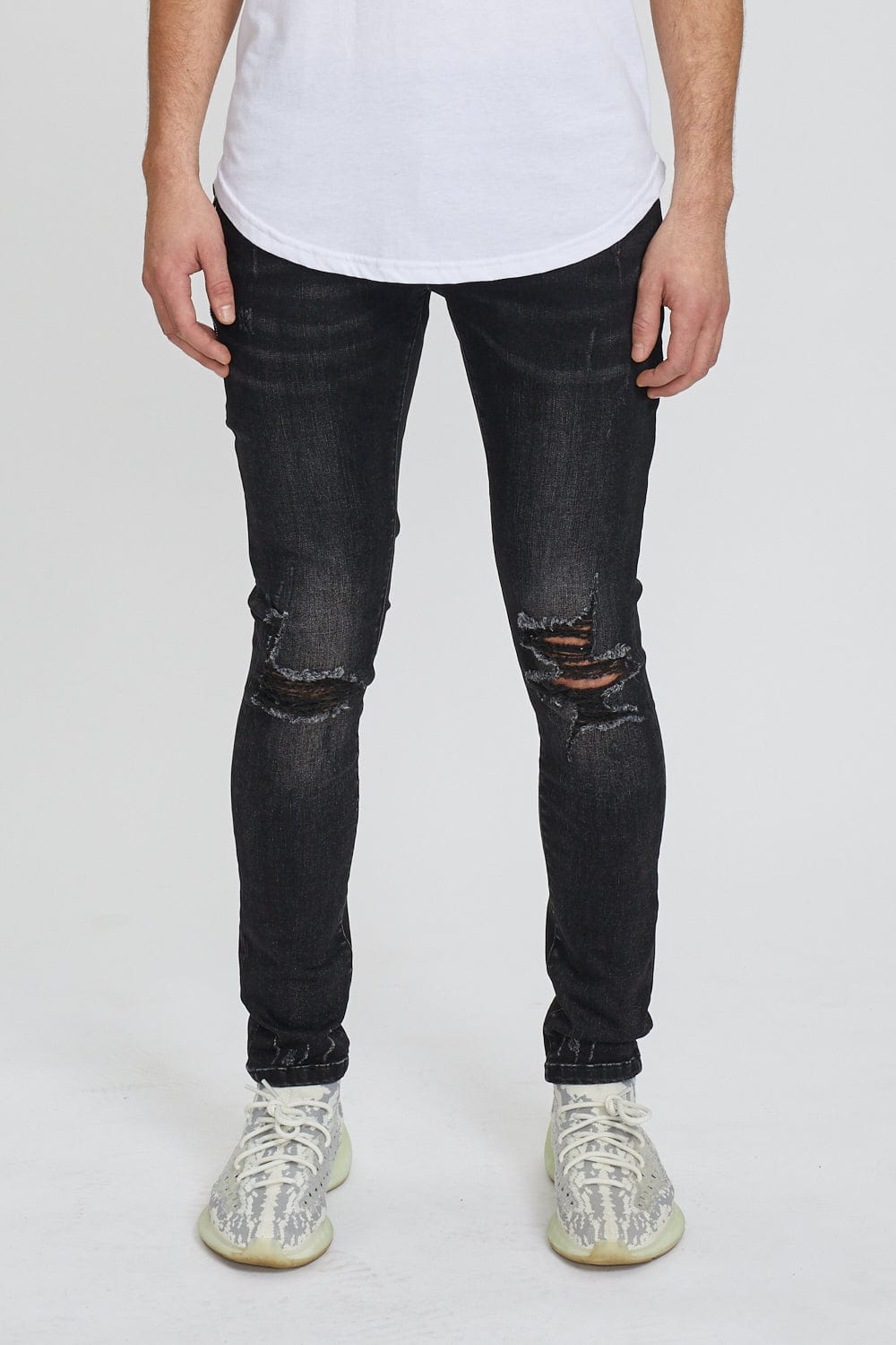 Black super ripped store jeans